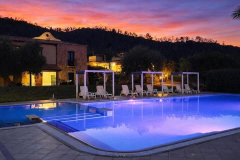 Seasonal outdoor pool, open 4 PM to 8 PM, pool umbrellas, sun loungers