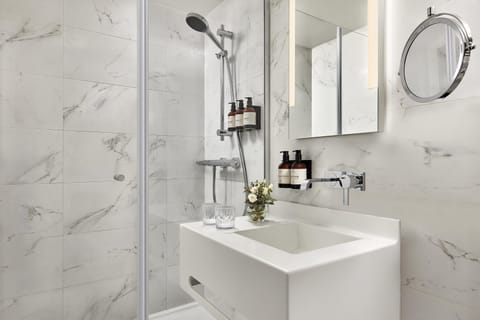 Shower, eco-friendly toiletries, hair dryer, bathrobes