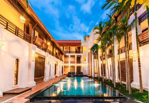 Outdoor pool, open 7:00 AM to 8:00 PM, pool umbrellas, sun loungers