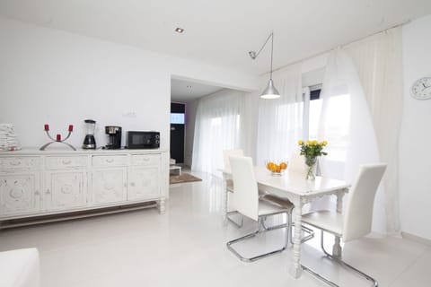 Two-Bedroom Apartment with Sea View and Balcony | Living area | 32-inch TV with digital channels, pay movies, streaming services