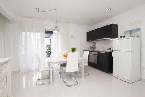 Two-Bedroom Apartment with Sea View and Balcony | Living area | 32-inch TV with digital channels, pay movies, streaming services