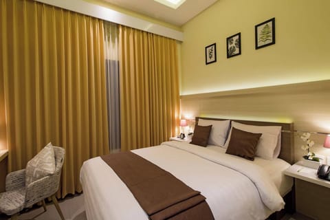 Deluxe Room | Premium bedding, in-room safe, desk, free WiFi