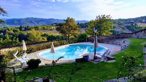 Seasonal outdoor pool, open 9:00 AM to 7:00 PM, sun loungers