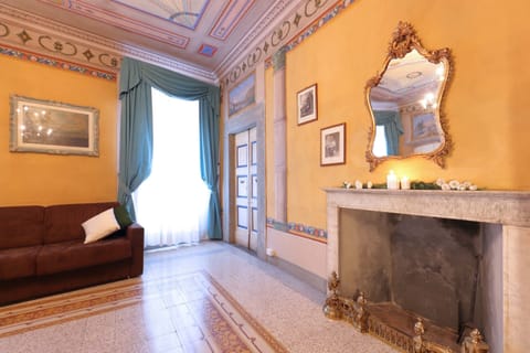 Grand Suite | Living area | 19-inch flat-screen TV with cable channels, TV