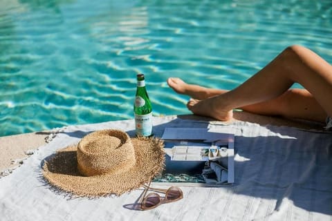 Outdoor pool, pool umbrellas, sun loungers