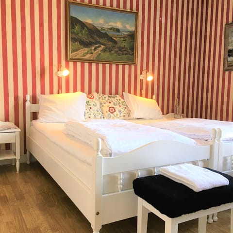 Large Twin Room, Private Bathroom | Iron/ironing board (on request), WiFi (free), individually decorated