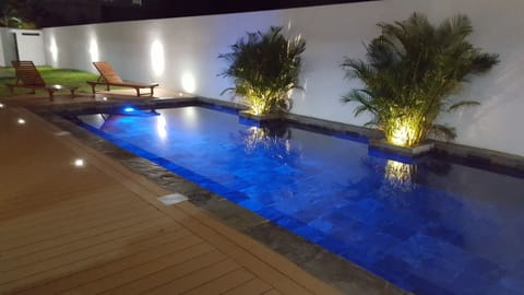 Outdoor pool, open 6 AM to 10 PM, sun loungers