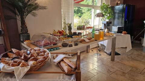 Daily buffet breakfast (EUR 12 per person)