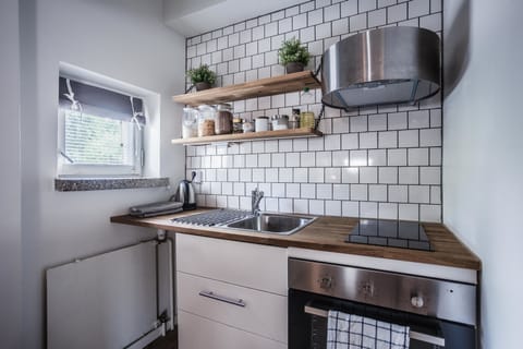 Studio, 2 Twin Beds | Private kitchen | Fridge, microwave, oven, stovetop