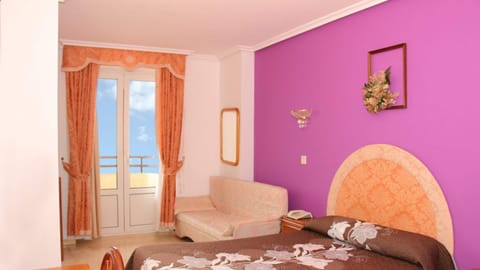 Triple Room | Desk, laptop workspace, blackout drapes, free WiFi