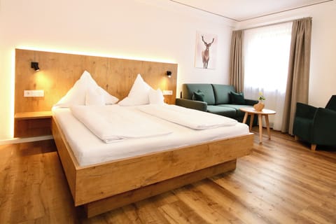 Basic Double Room | Minibar, in-room safe, desk, blackout drapes