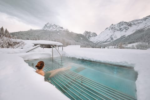 Indoor pool, outdoor pool, pool umbrellas, sun loungers