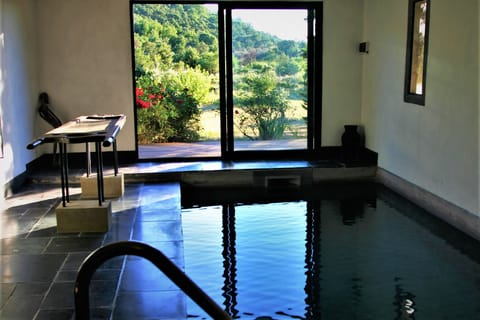 Indoor pool, outdoor pool, pool umbrellas, sun loungers