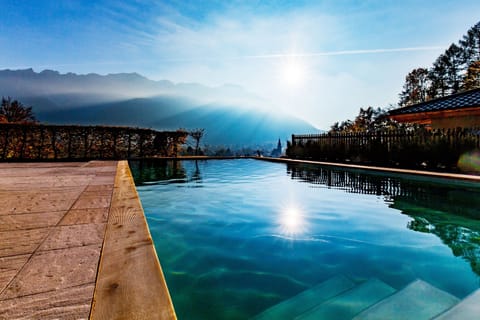 Outdoor pool, pool umbrellas, sun loungers