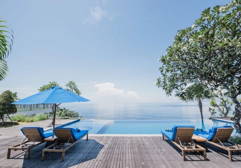 Outdoor pool, open 6:00 AM to 8:00 PM, sun loungers