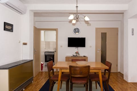 Comfort Studio | Living area | 23-inch LED TV with cable channels, TV, toys