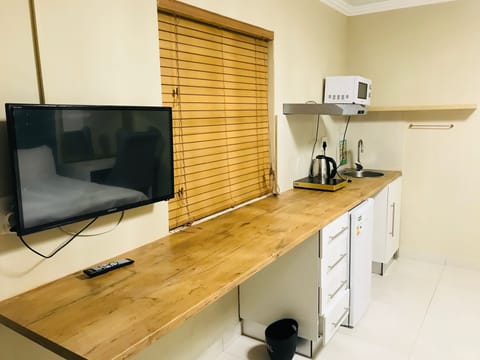 Standard Double Room, Kitchen | Private kitchen | Fridge, electric kettle