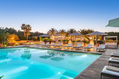 Outdoor pool, open 10:30 AM to 7:00 PM, pool umbrellas, sun loungers