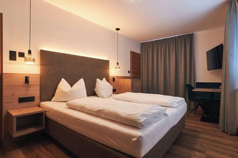 Deluxe Double Room, Balcony, Mountain View | In-room safe, individually decorated, individually furnished, desk