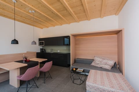 Penthouse, Balcony, Mountain View | Living area | 32-inch flat-screen TV with satellite channels