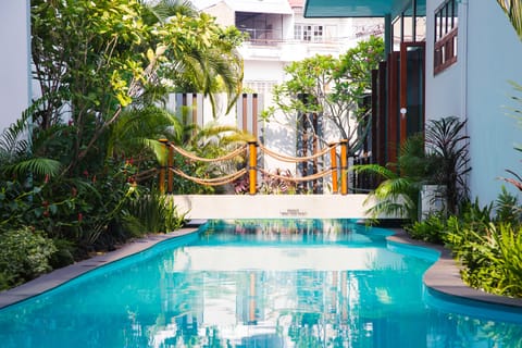 Outdoor pool, open 8:00 AM to 8:00 PM, sun loungers