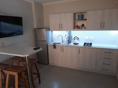 Standard Family Room | Private kitchen | Fridge, coffee/tea maker, electric kettle