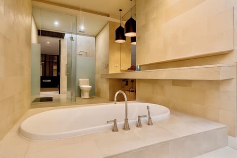 Villa | Bathroom | Rainfall showerhead, free toiletries, hair dryer, bathrobes