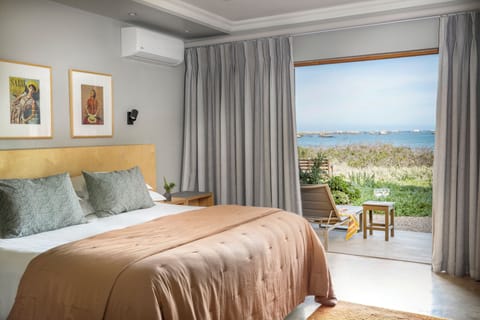 Deluxe Room, Sea View, Beachfront (Breeze Deluxe sea facing) | Minibar, in-room safe, individually decorated, individually furnished