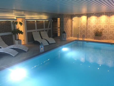 Indoor pool, open 8:00 AM to 9:00 PM, sun loungers