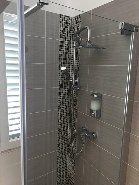 Shower, free toiletries, hair dryer, towels