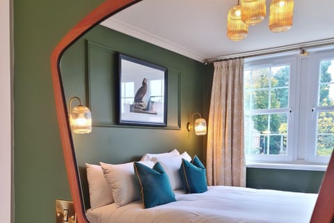 Superior Studio Suite, 1 Queen Bed, River View | Pillowtop beds, individually decorated, individually furnished