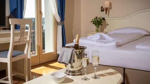 Down comforters, minibar, in-room safe, desk