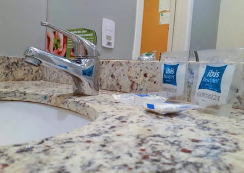 Shower, eco-friendly toiletries, towels, soap