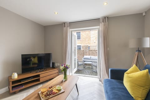 Standard Apartment, 2 Bedrooms | Living area | 32-inch flat-screen TV with digital channels, TV, Netflix