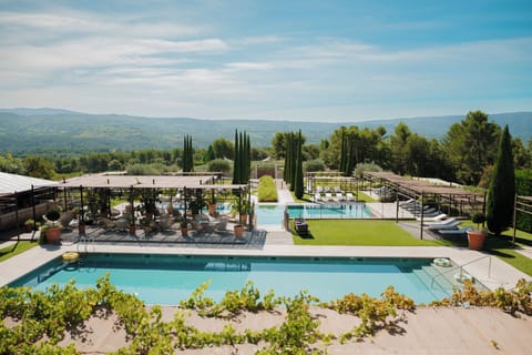 Indoor pool, 2 outdoor pools, open 9:00 AM to 6:00 PM, pool umbrellas