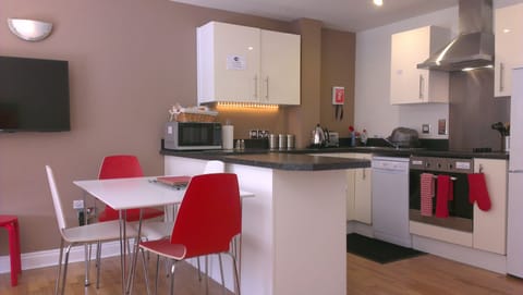 Premium Apartment, 2 Bedrooms | Private kitchen | Full-size fridge, microwave, oven, stovetop