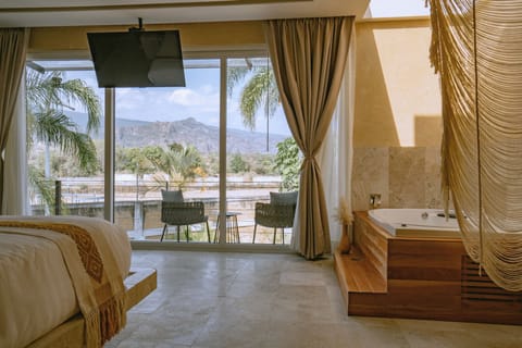 Deluxe Suite with Hot tub and Mountain View | Terrace/patio