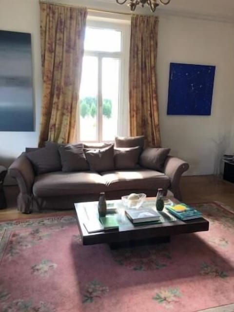 100-cm TV with cable channels, DVD player