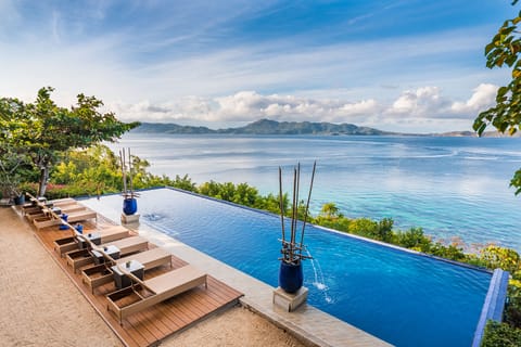 Outdoor pool, open 6:00 AM to midnight, sun loungers