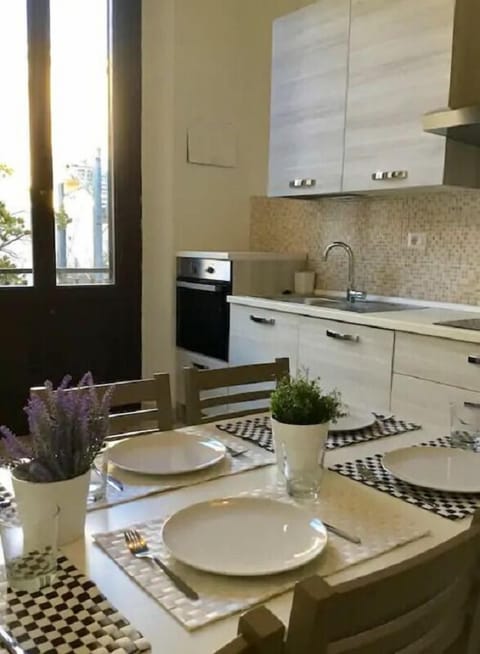 Apartment, 4 Bedrooms, 2 Bathrooms | Private kitchen | Full-size fridge, microwave, oven, stovetop
