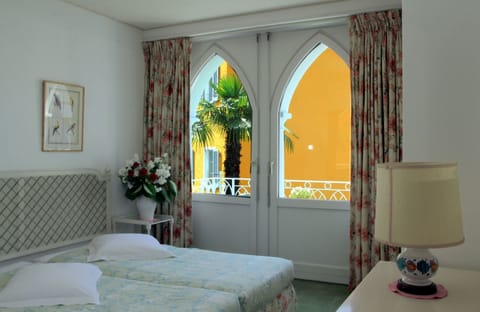 Standard Double Room, Multiple Beds, Non Smoking | Down comforters, minibar, blackout drapes, free WiFi