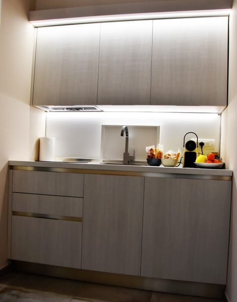 Junior Suite, Kitchenette | Private kitchenette | Fridge, oven, stovetop, dishwasher