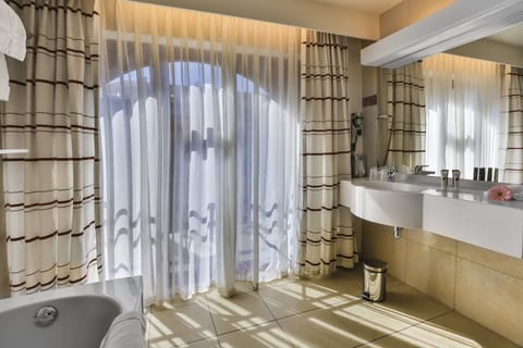 Comfort Room | Bathroom | Shower, free toiletries, hair dryer, slippers