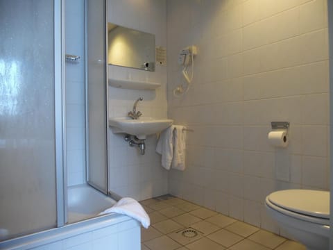 Shower, eco-friendly toiletries, hair dryer, towels