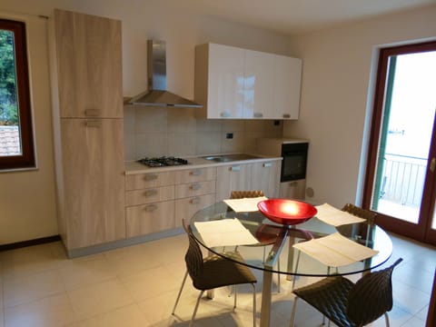 Apartment, 1 Bedroom, Lake View | Private kitchen | Oven, stovetop, dishwasher, cookware/dishes/utensils