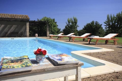 Seasonal outdoor pool, pool umbrellas, sun loungers
