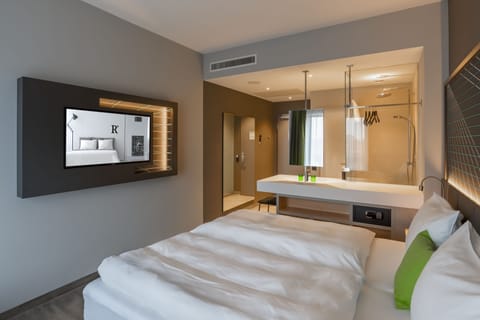 Hypo-allergenic bedding available, in-room safe, desk, laptop workspace