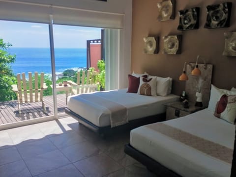 Deluxe Quadruple Room | Egyptian cotton sheets, premium bedding, in-room safe