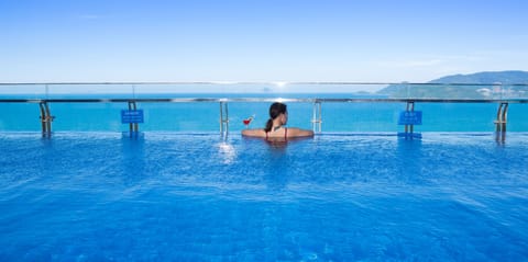 Outdoor pool, open 6:00 AM to 9:00 PM, sun loungers