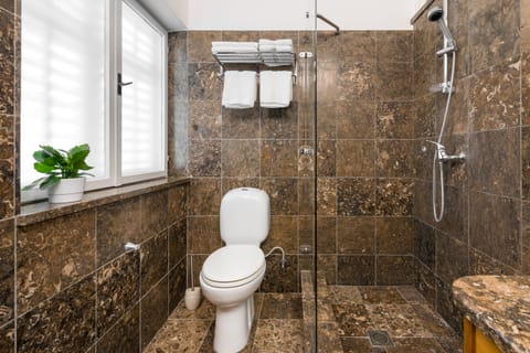 Hair dryer, slippers, towels